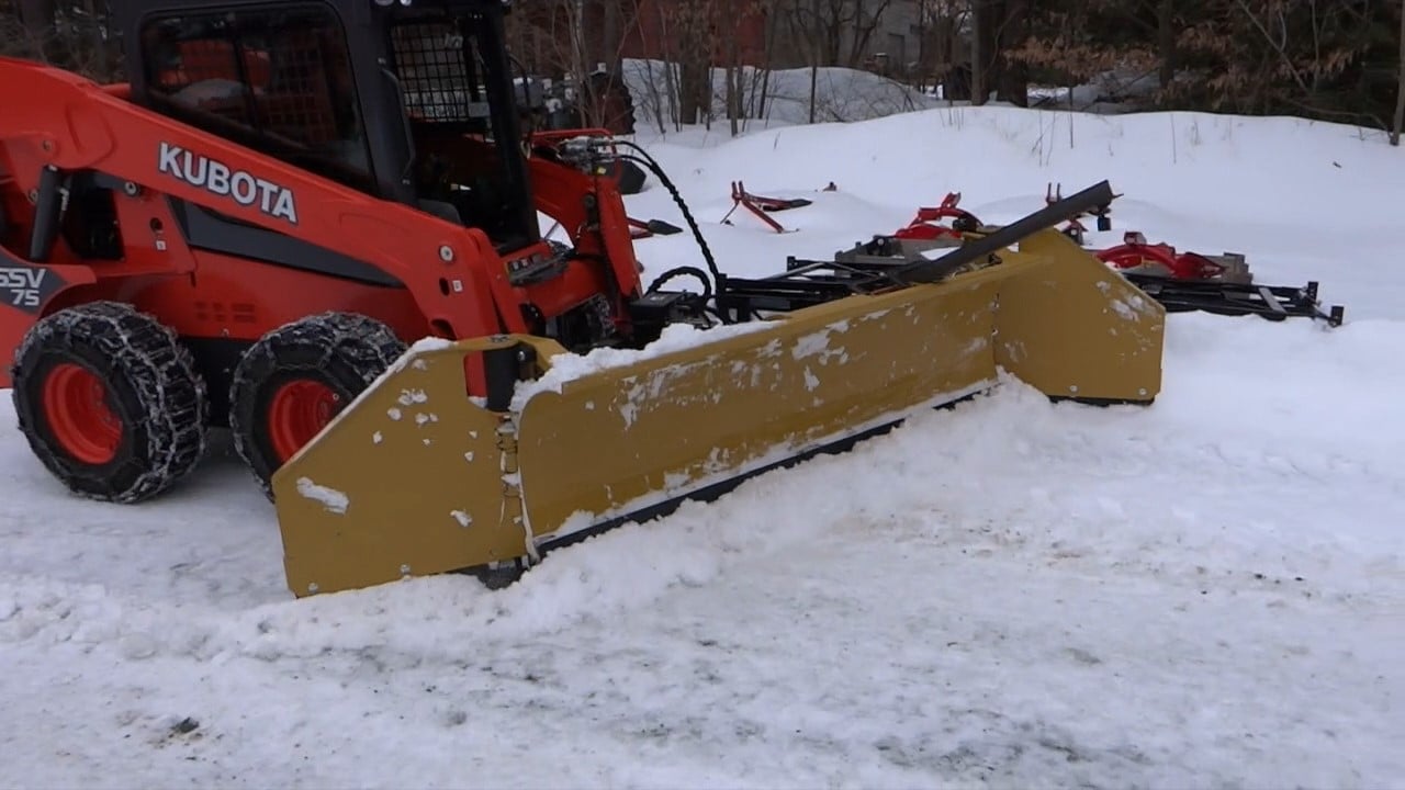 Kubota SSV75 Skid Steer with HLA Snow Wing